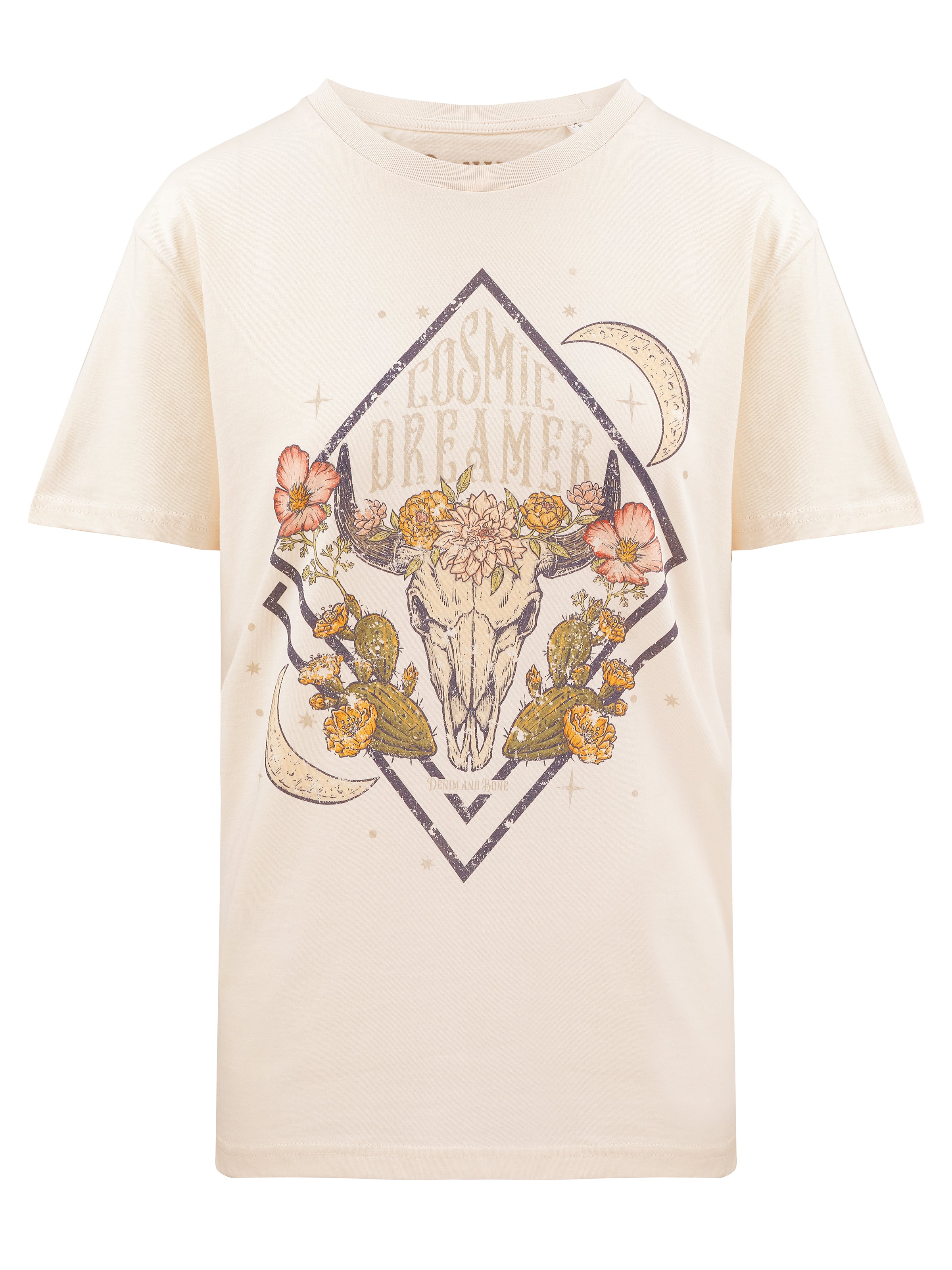 Cream graphic T-shirt featuring a floral longhorn skull design with crescent moons, desert cacti, and "Cosmic Dreamer" text on a white background.
